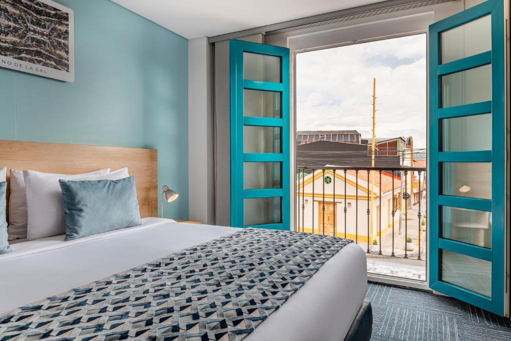 Postel nebo postele na pokoji v ubytování Hotel Camino de la Sal
