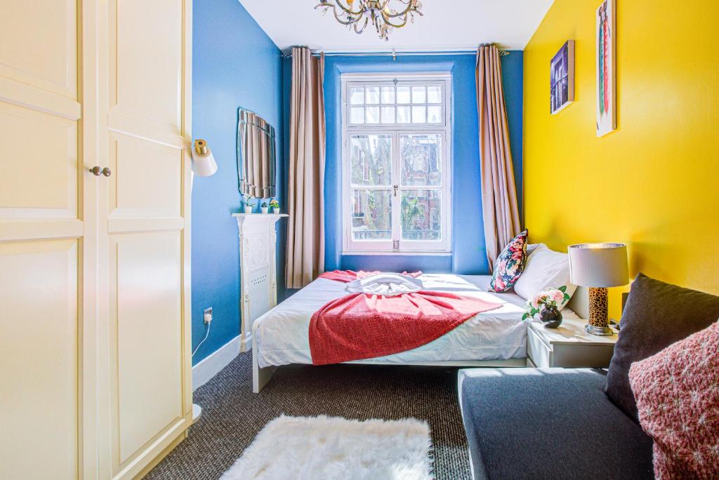 Un ou plusieurs lits dans un hébergement de l'établissement Oxford Street Luxury Flat in Central London