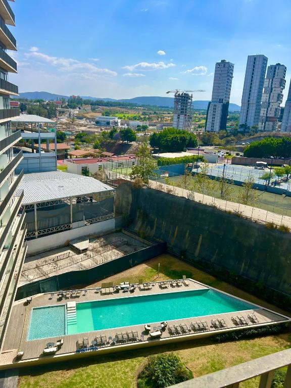 an overhead view of a building with two swimming pools at Departameto de Lujo cerca de Mall Andares in Guadalajara