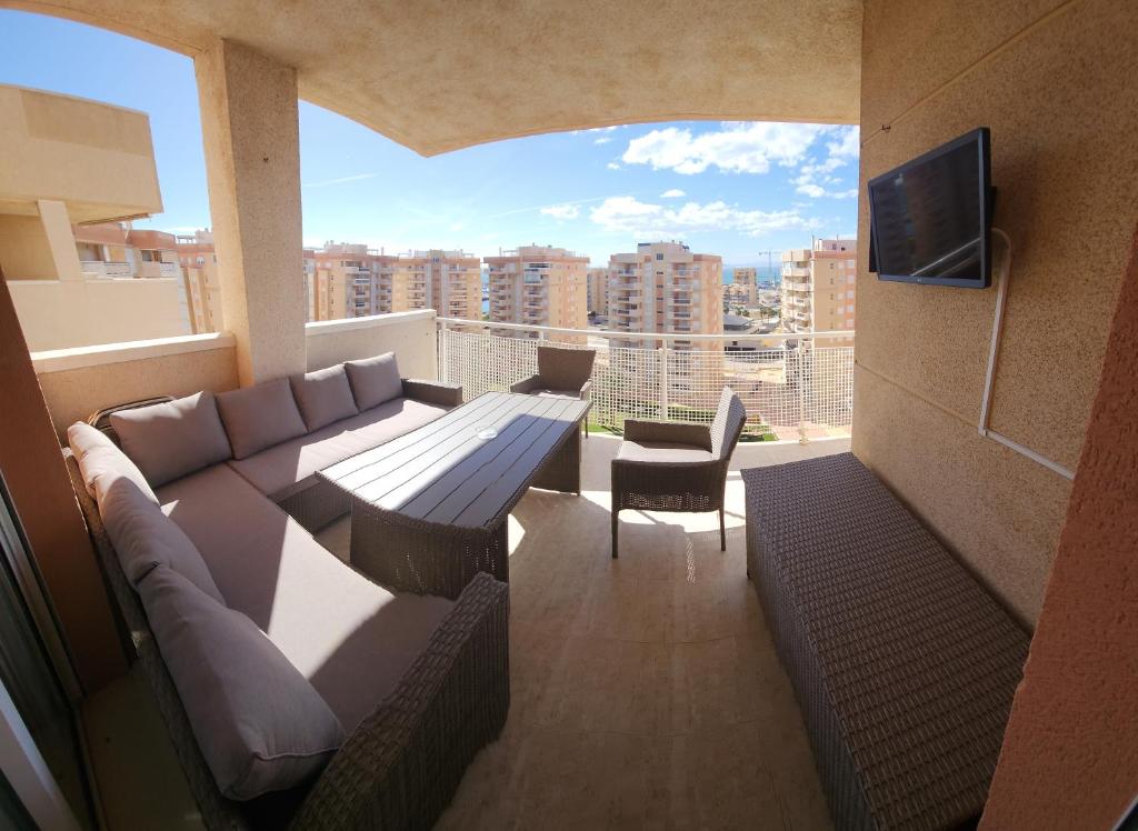 Et tv og/eller underholdning på Apartamento Turquesa La Manga