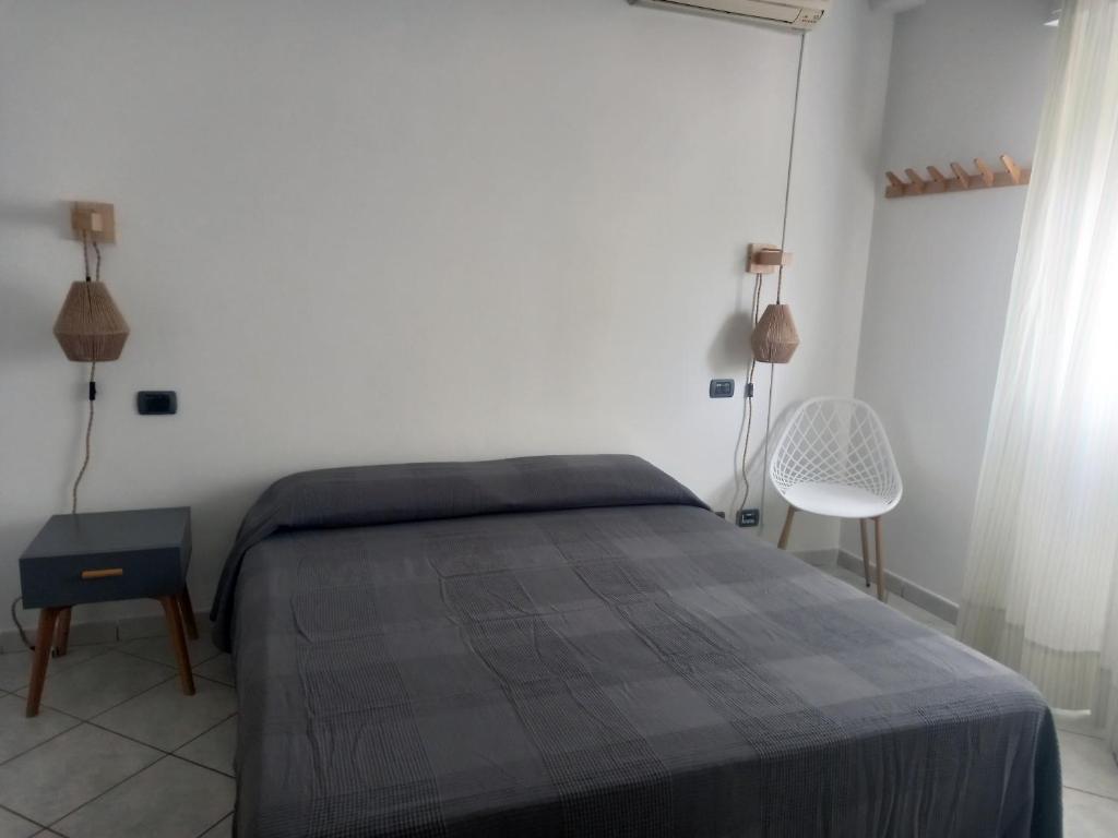 Postel nebo postele na pokoji v ubytování Villa Acquamarina