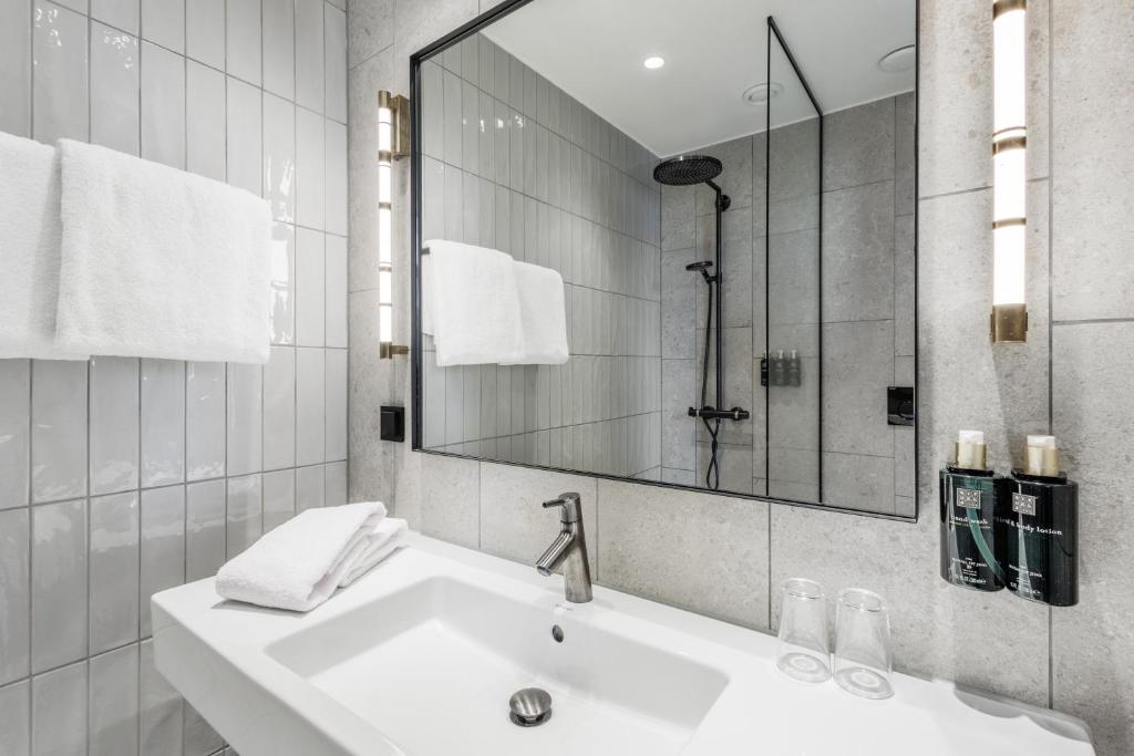 Koupelna v ubytování Home Hotel Tapetfabriken