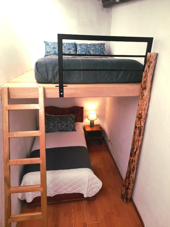 Postel nebo postele na pokoji v ubytování Casa Verde Descanso 1