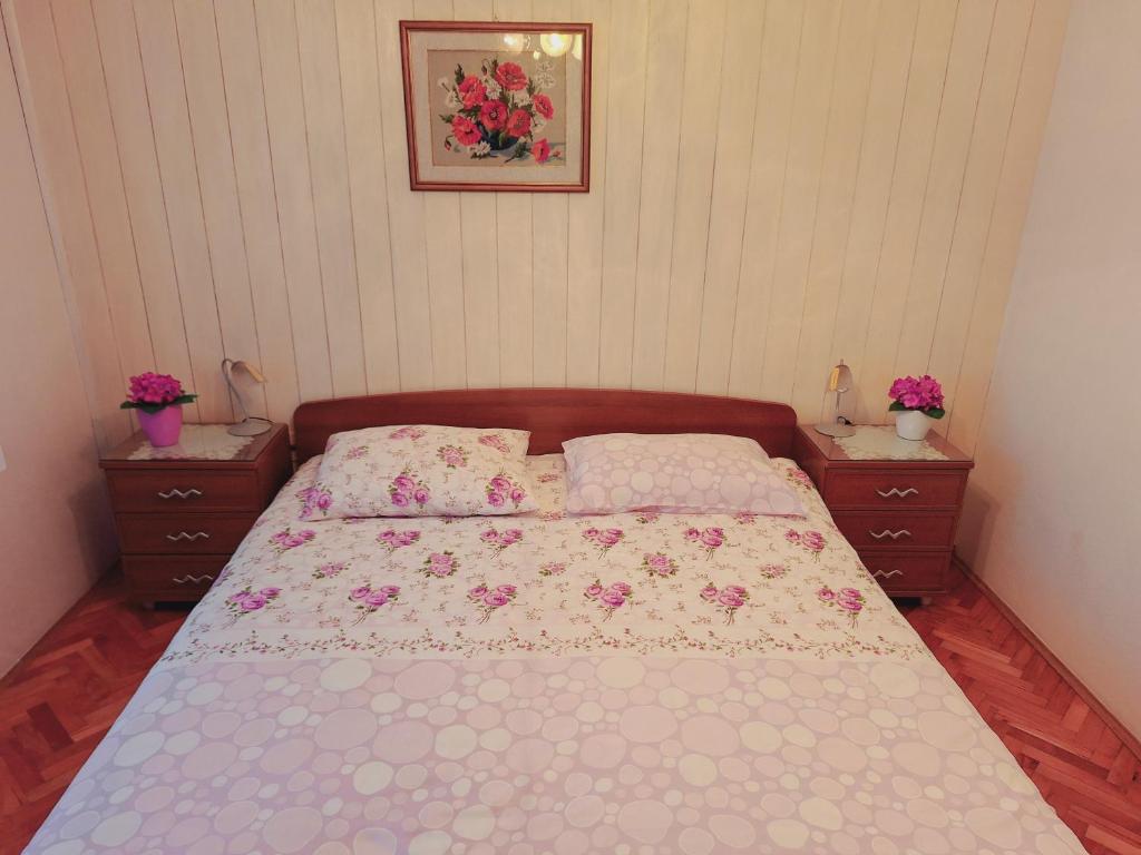 Postel nebo postele na pokoji v ubytování Apartma Ferjan