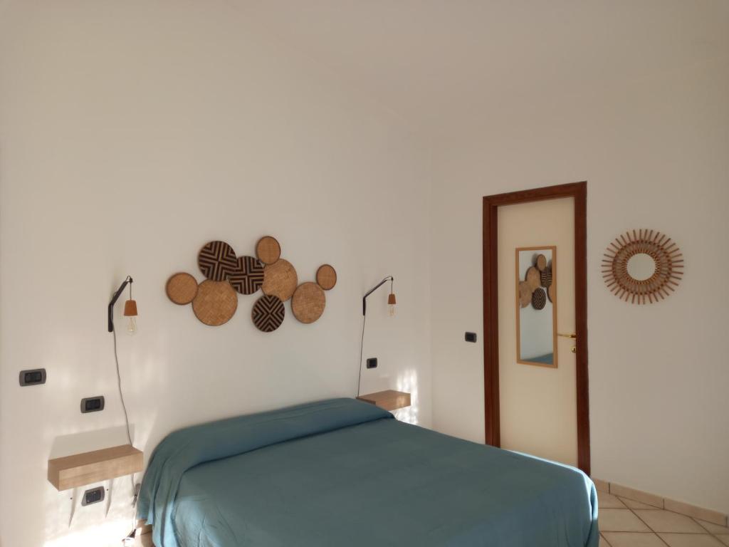 Postel nebo postele na pokoji v ubytování Villa Acquamarina