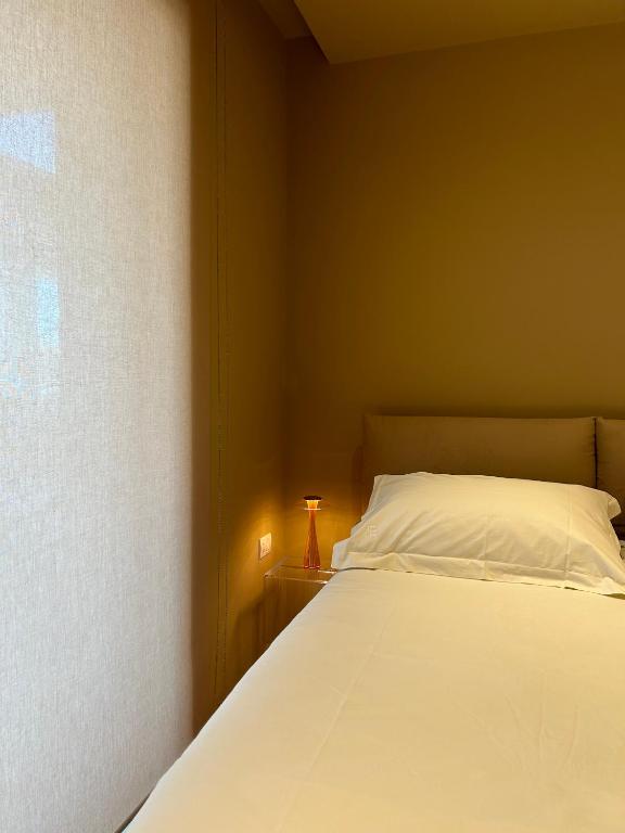 Postel nebo postele na pokoji v ubytování golden suites 2