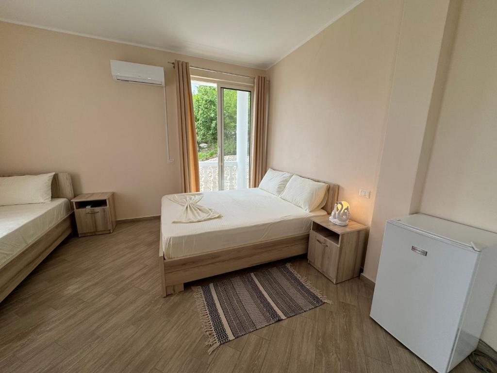 Postel nebo postele na pokoji v ubytování Vila Horizont
