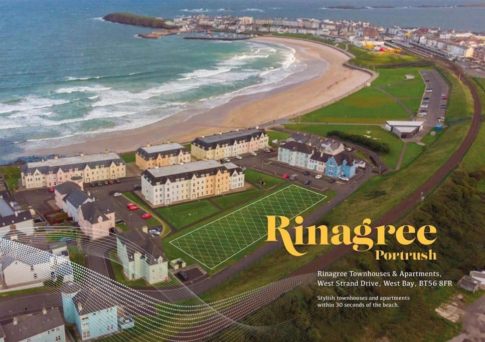 an aerial view of the beach and the ocean at Coastal Haven 5 Bed Gem in Portrush Center in Portrush