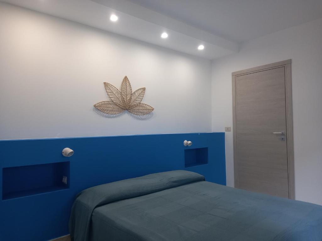 Postel nebo postele na pokoji v ubytování Villa Acquamarina