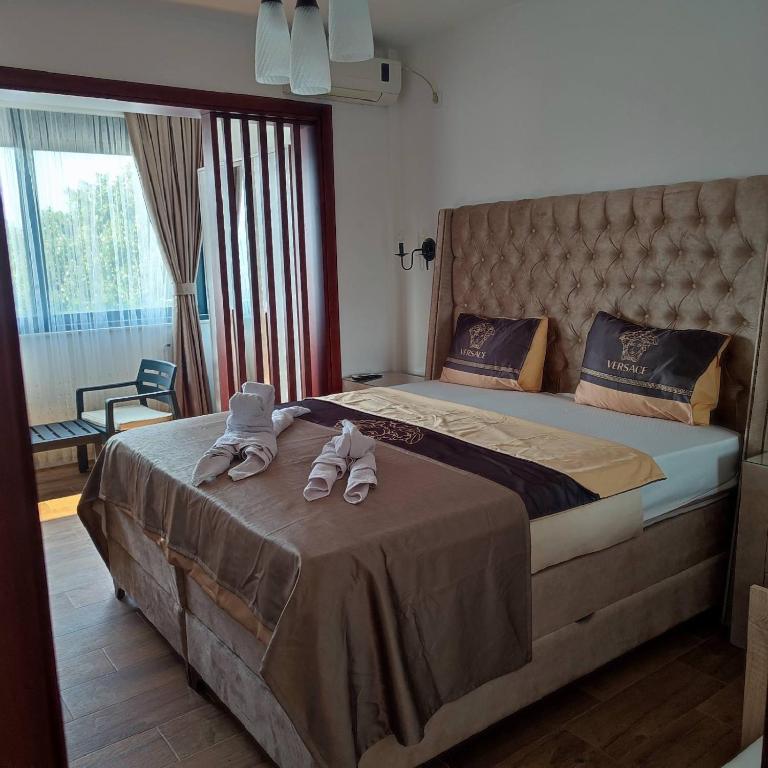 Postel nebo postele na pokoji v ubytování Apartments Miri