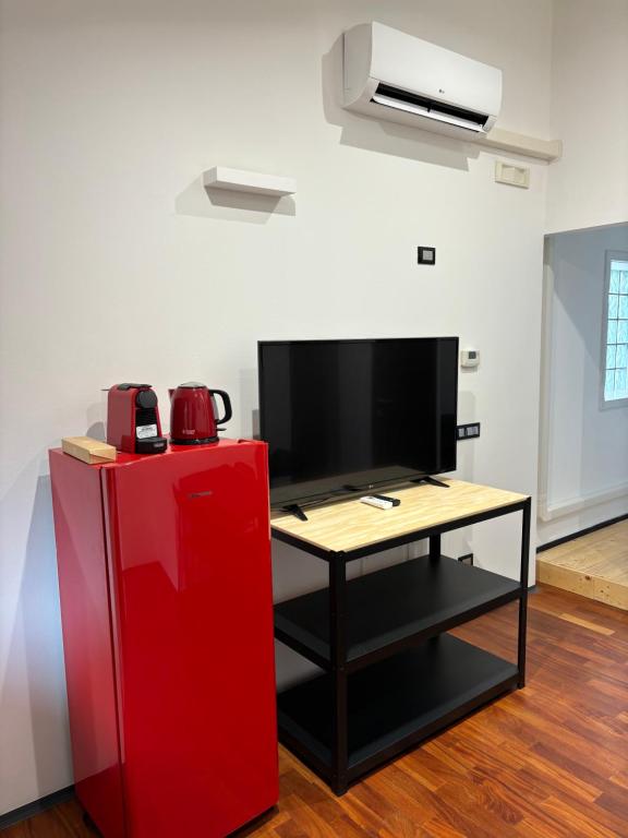 TV a/nebo společenská místnost v ubytování B&B Tre scimmiette
