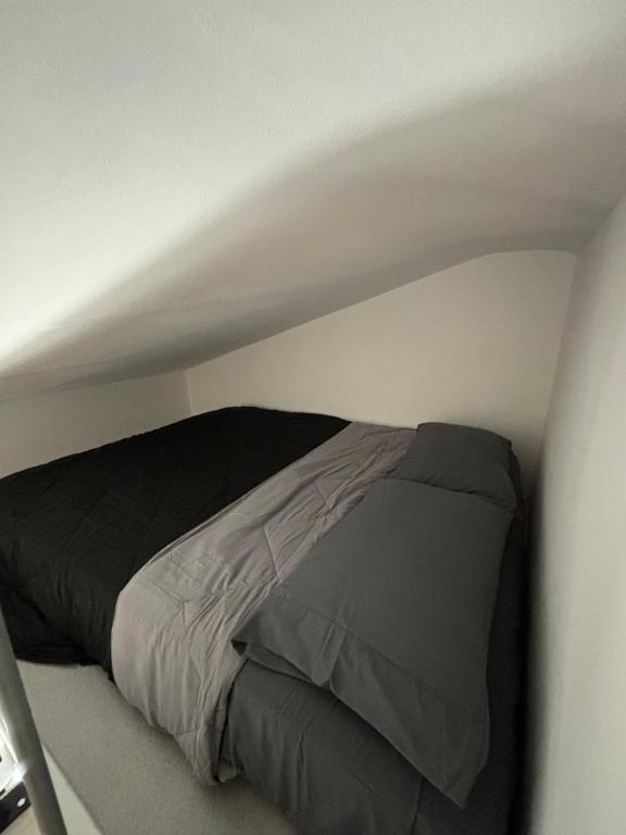 Postel nebo postele na pokoji v ubytování B&B Tre scimmiette