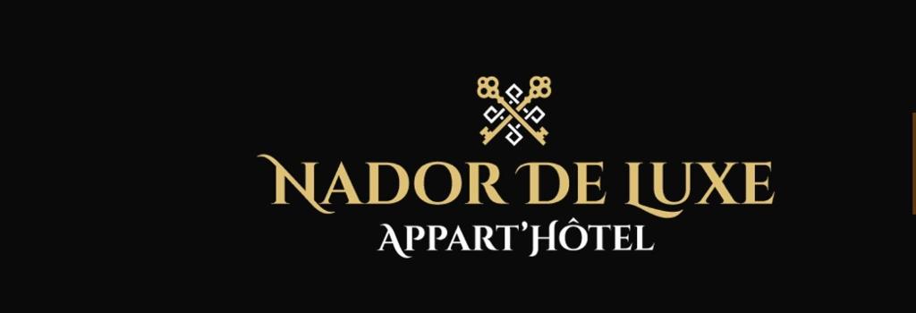 um logótipo dourado com as palavras nordbard duke apartment hotel em Apart Nador de Luxe 1 em Nador