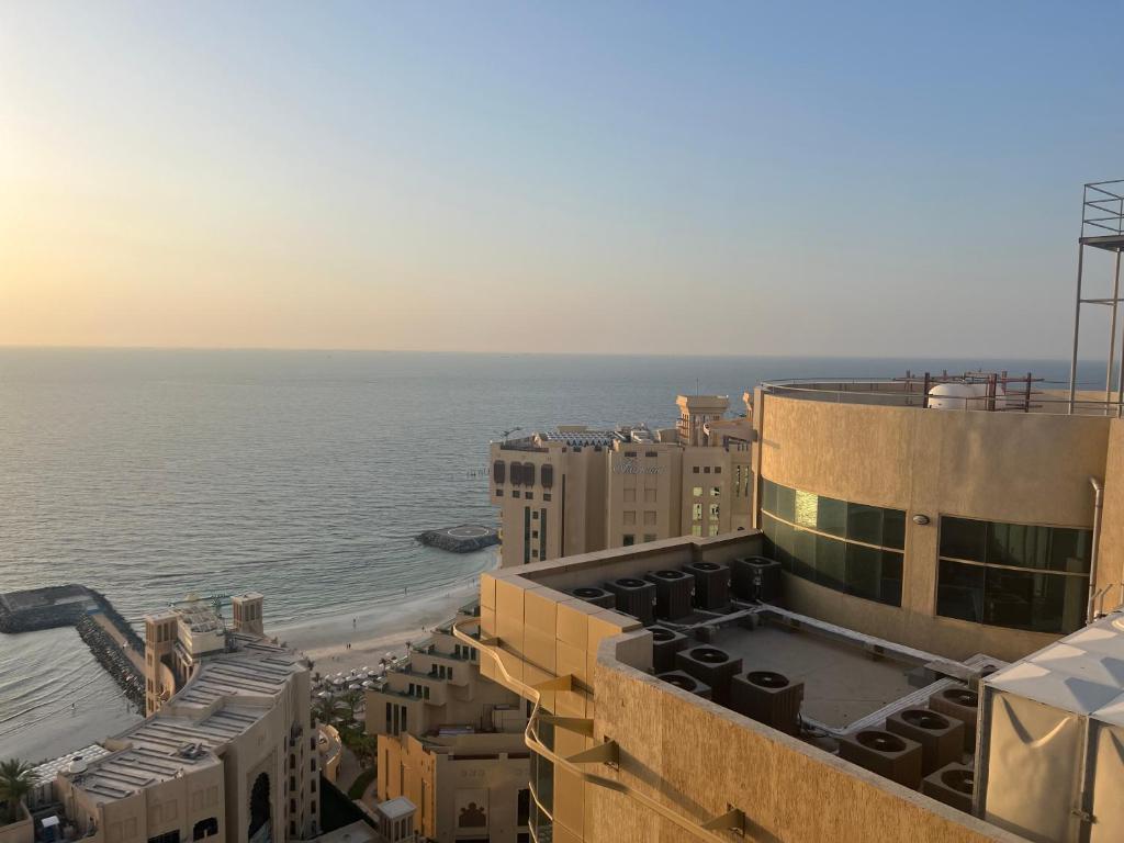 a view of the ocean from the top of a building at P3) Fantastic Seaview Room with shared bath inside 3bedroom apartment in Ajman 