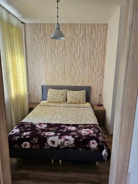 Posteľ alebo postele v izbe v ubytovaní Apartament Góralska