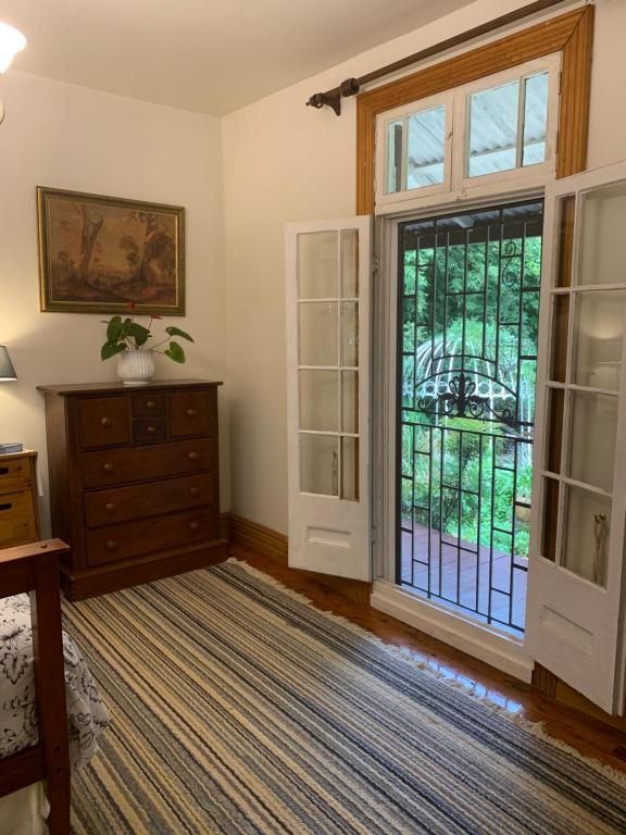 Garden studio - Twee Slaapkamers Huis