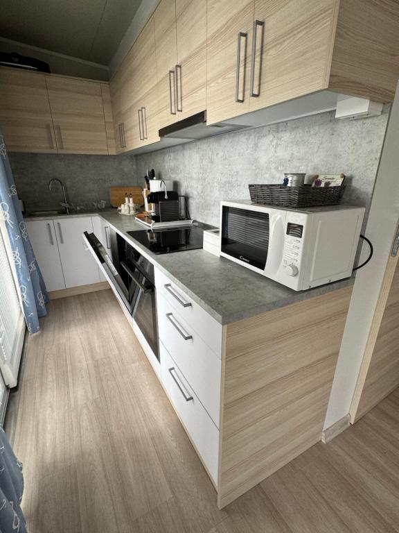 Kuchyň nebo kuchyňský kout v ubytování Marty House Drage