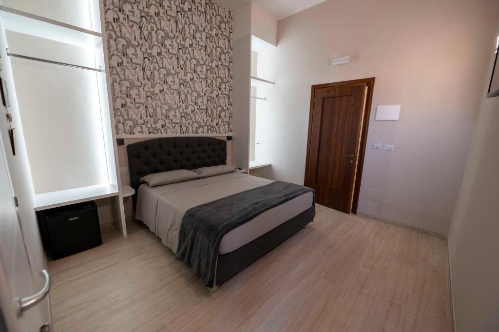 Postel nebo postele na pokoji v ubytování TERESITA Guest House