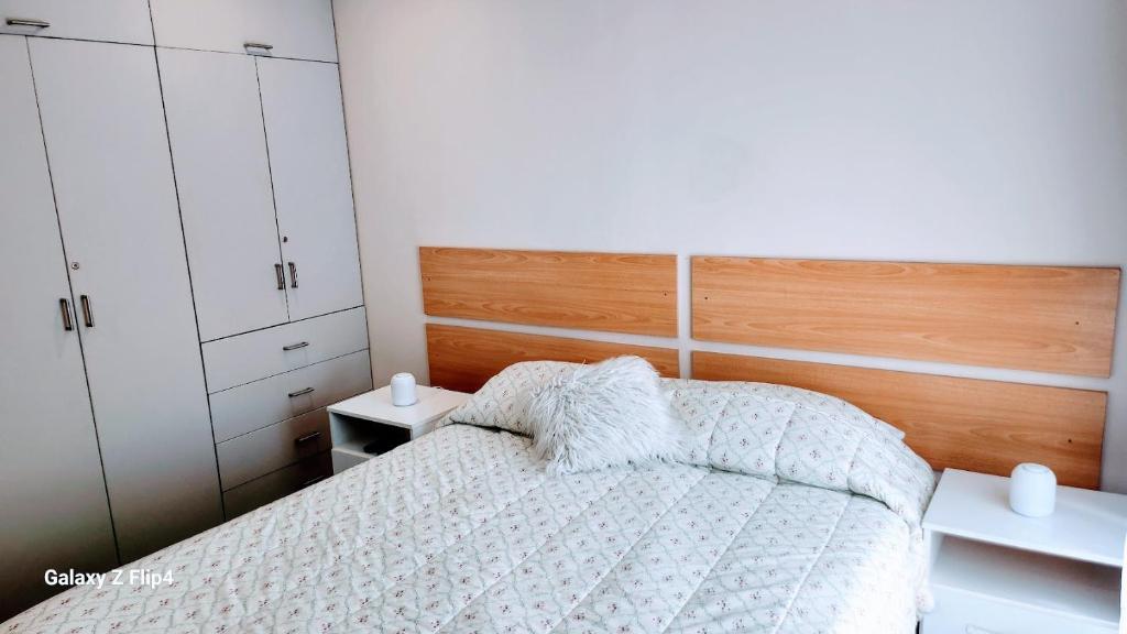 Ένα ή περισσότερα κρεβάτια σε δωμάτιο στο Mini Departamento Acogedor