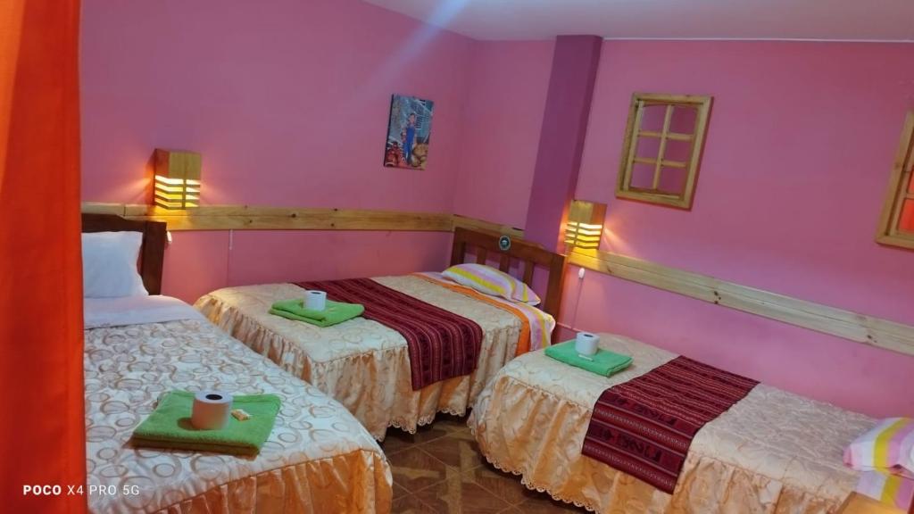 Postel nebo postele na pokoji v ubytování Jaimes Inn Hostel