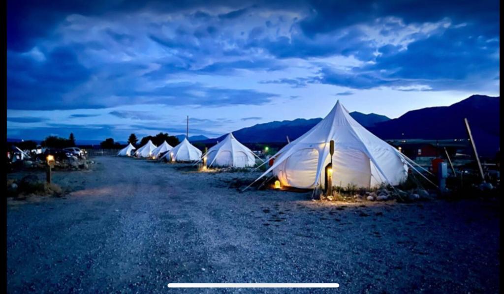 a row of tents sitting in the middle of a road at Arkansas River -P- Glamour Yurt and Breakfast in Buena Vista