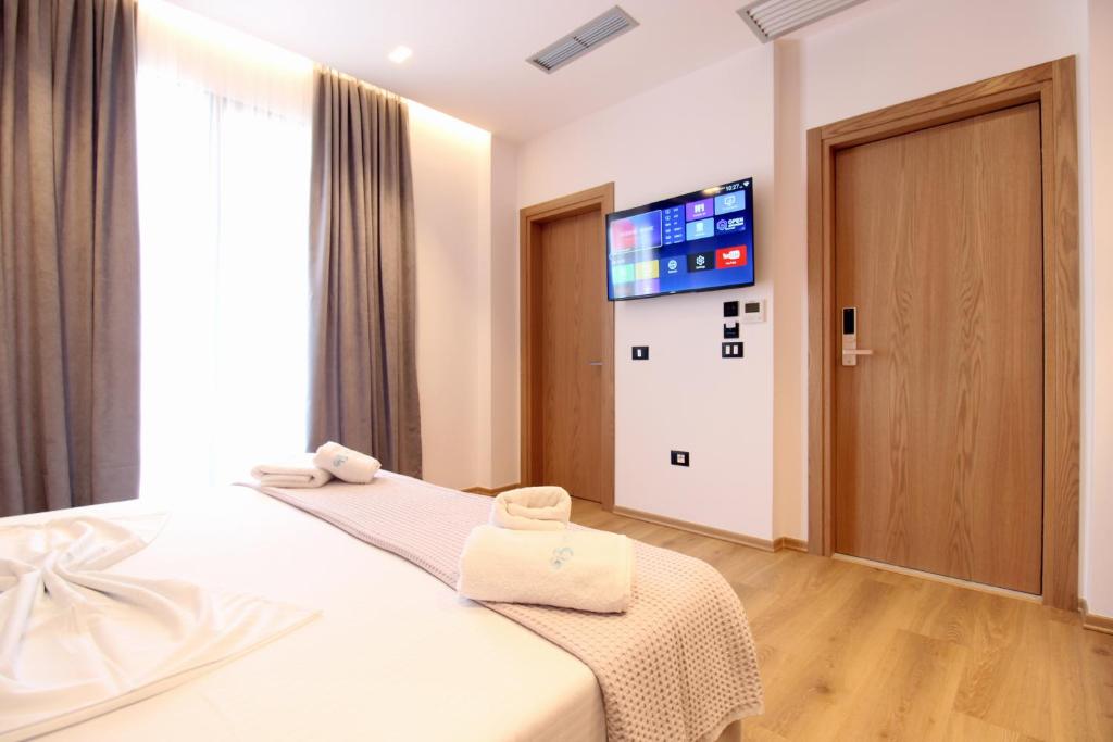 Postel nebo postele na pokoji v ubytování Ionian's Breeze Hotel