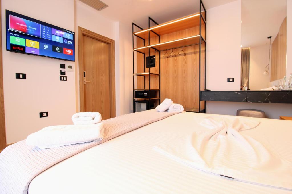 Postel nebo postele na pokoji v ubytování Ionian's Breeze Hotel