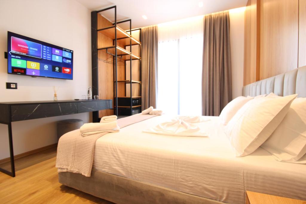 Postel nebo postele na pokoji v ubytování Ionian's Breeze Hotel