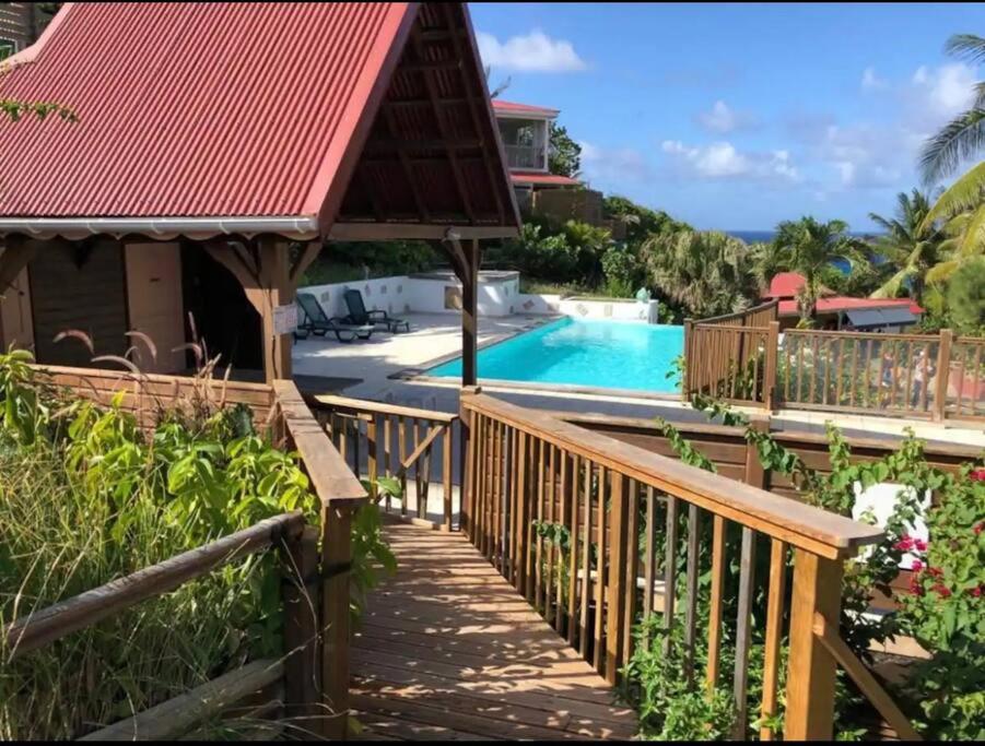 Bazén v ubytování La Ruche - Bungalow avec vue mer nebo v jeho okolí