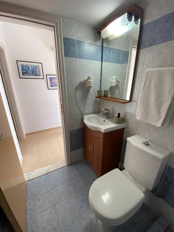 Koupelna v ubytování Corafili Holiday Suites