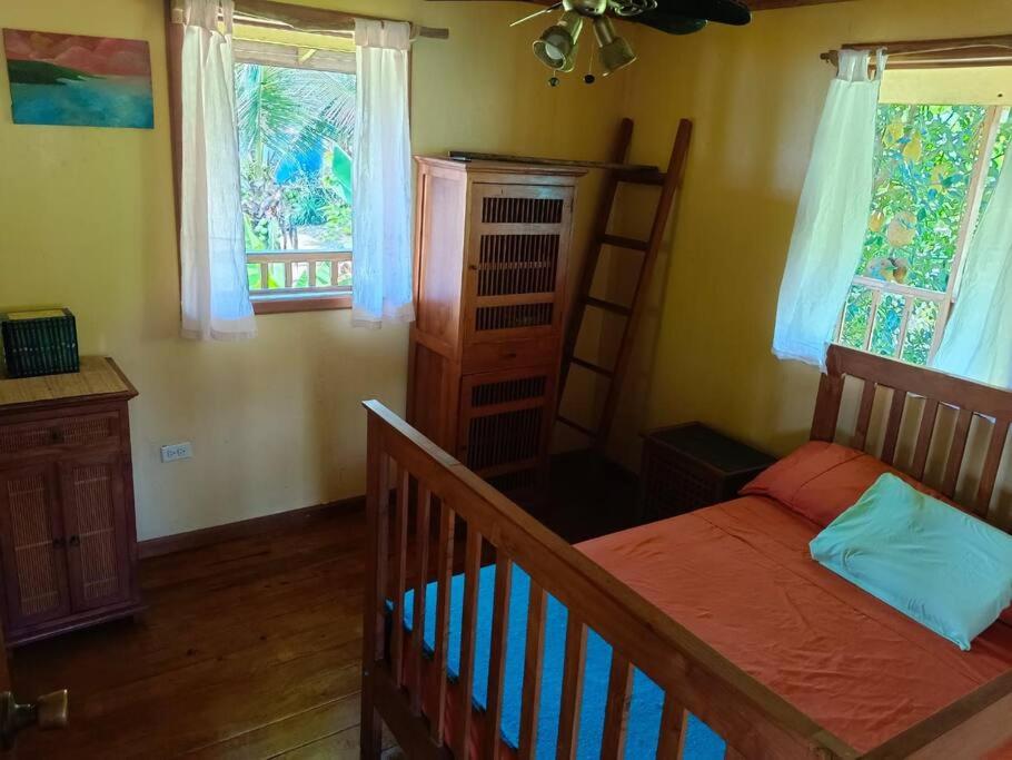Postel nebo postele na pokoji v ubytování Casa Ylang - Old Bank, Bastimentos