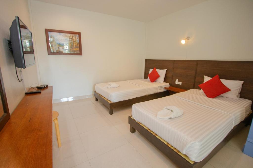 Postel nebo postele na pokoji v ubytování Kallapangha Resort Khlongwan
