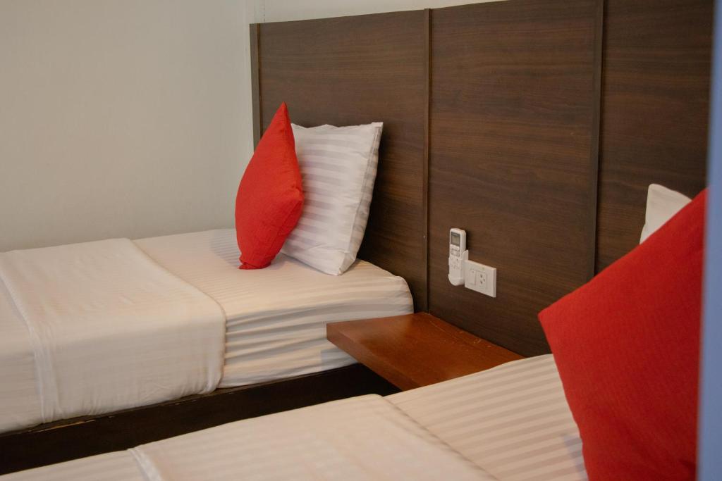 Postel nebo postele na pokoji v ubytování Kallapangha Resort Khlongwan