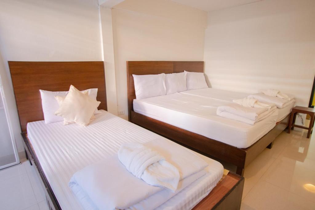 Postel nebo postele na pokoji v ubytování Kallapangha Resort Khlongwan