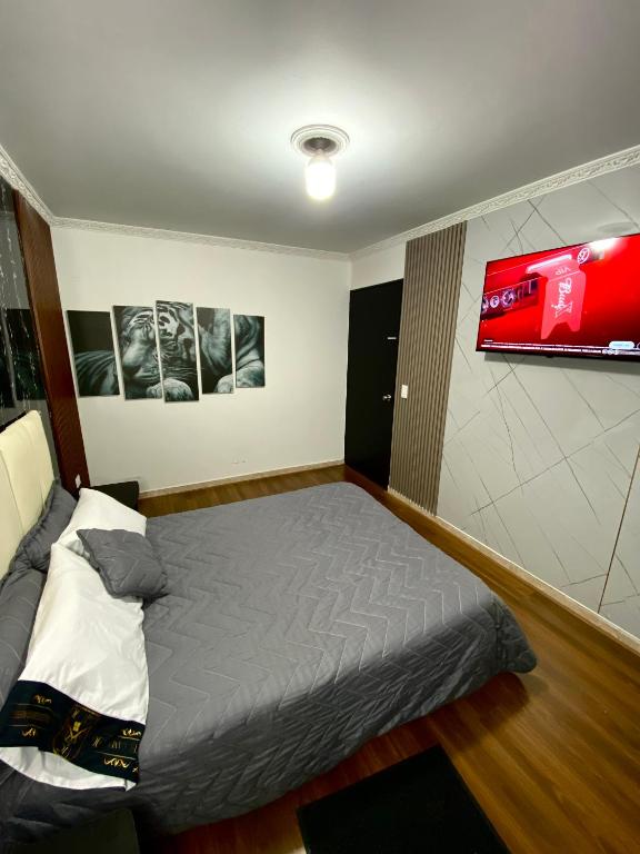 Postel nebo postele na pokoji v ubytování Hotel Canela 96