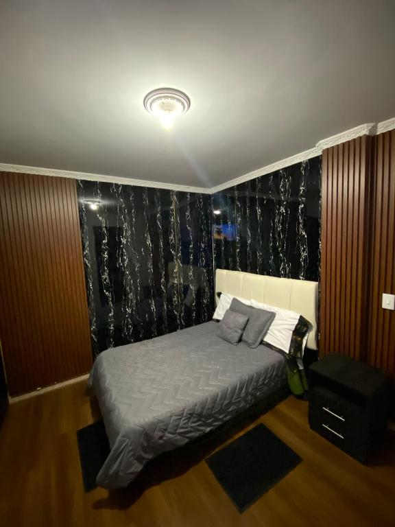 Postel nebo postele na pokoji v ubytování Hotel Canela 96