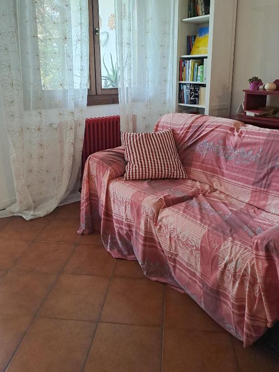Postel nebo postele na pokoji v ubytování Alloggio il Giglio