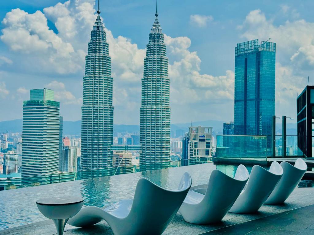 a view of the petronas twin towers from the top of a building at Imperial Luxury Residence KLCC By AR Hospitality in Kuala Lumpur