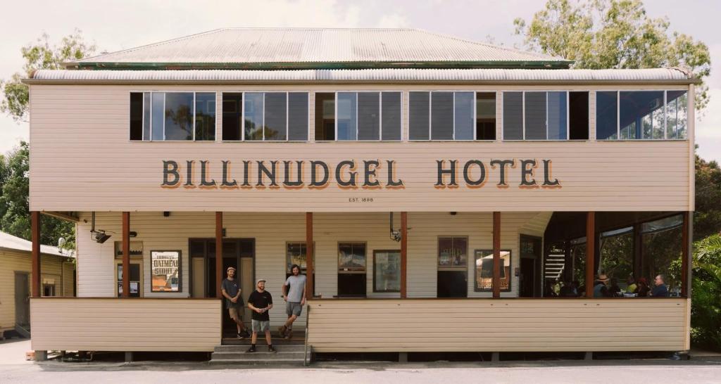 a building with people standing outside of it at Billinudgel Hotel in Billinudgel