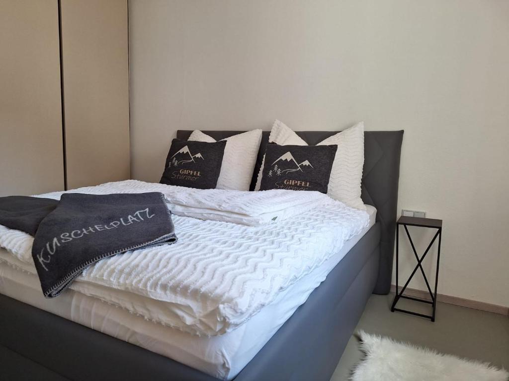 Кровать или кровати в номере Apartment Gamsblick