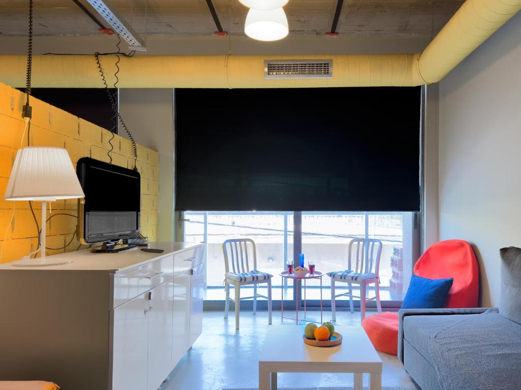 TV a/nebo společenská místnost v ubytování Ceramus Apartments Gazi View