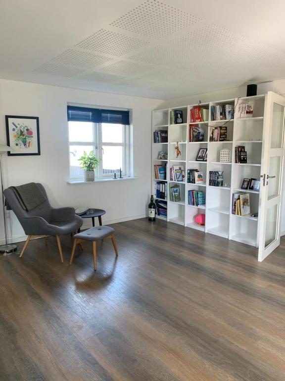 Posezení v ubytování Hus i Løkken