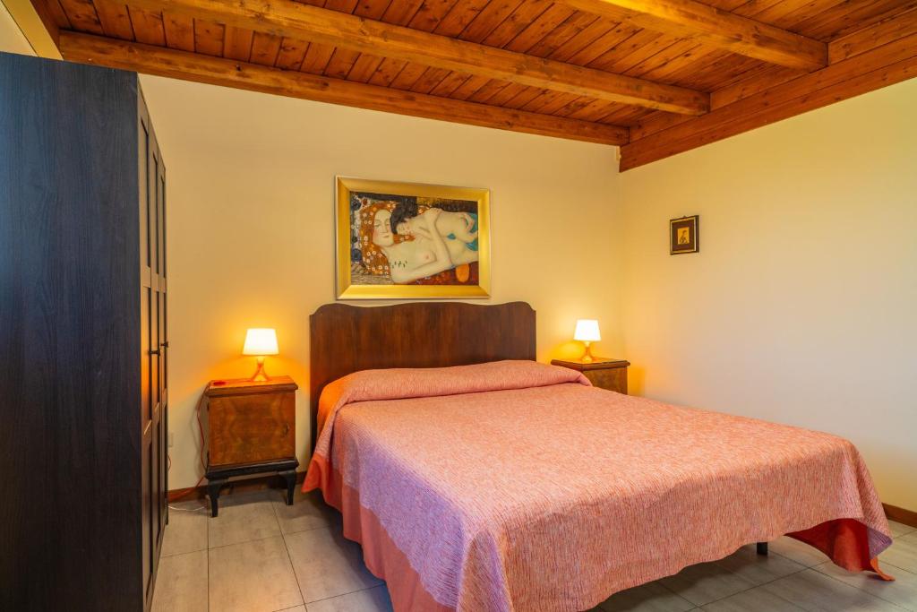 Posteľ alebo postele v izbe v ubytovaní Tuccios villa