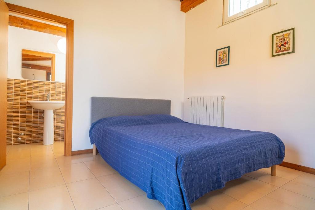 Posteľ alebo postele v izbe v ubytovaní Tuccios villa
