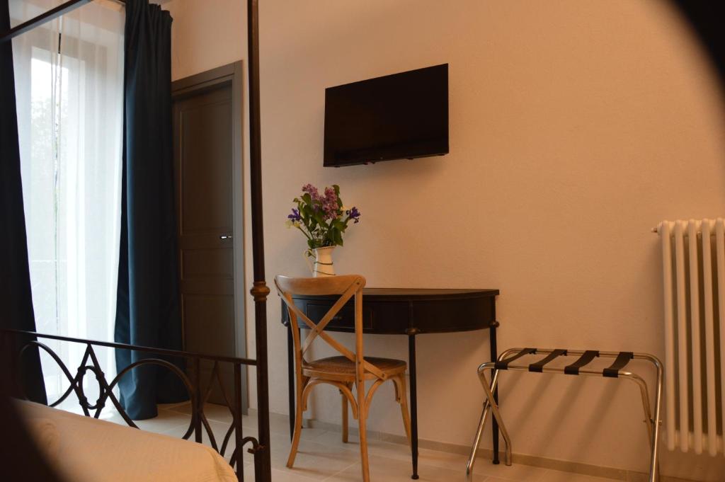TV a/nebo společenská místnost v ubytování B&B Casa Anaceta