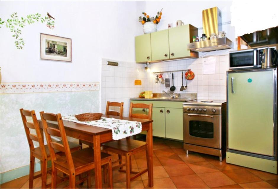 A kitchen or kitchenette at Il Giardino Apartment