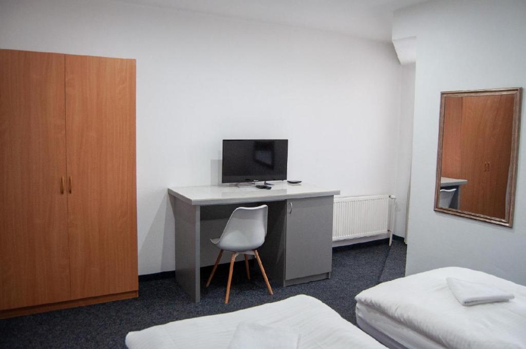 TV a/nebo společenská místnost v ubytování Hotel Joker