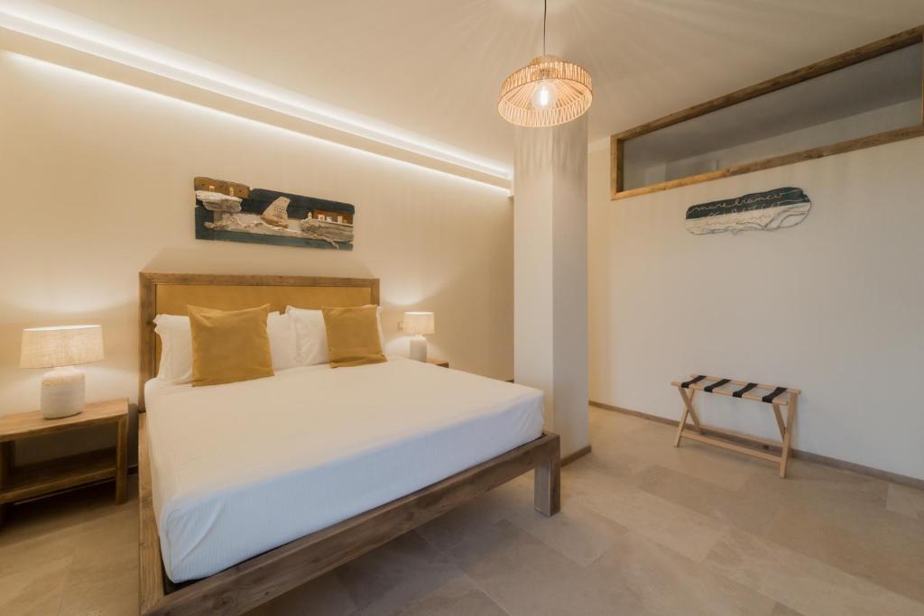 Voodi või voodid majutusasutuse BnB Il Grecale toas