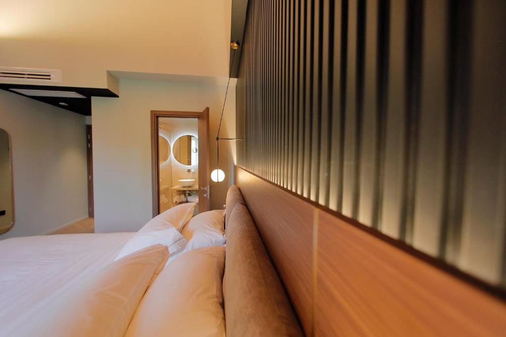 Postel nebo postele na pokoji v ubytování Hotel Namia by Dori