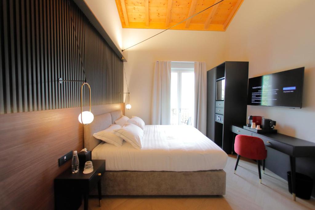 Postel nebo postele na pokoji v ubytování Hotel Namia by Dori